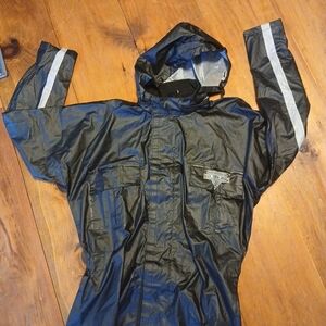 Nelson Rigg rain jacket. Size Small, Hooded, Black.
